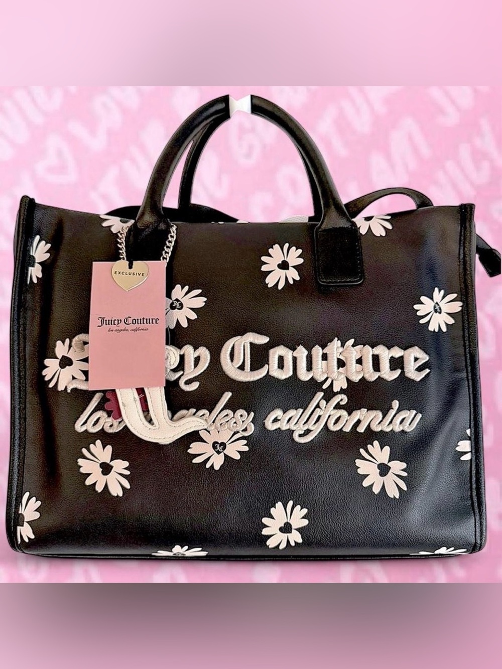 Juicy Couture Los Angeles Black Daisy Tote with white daisy print & charm